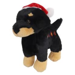 Pluche kersthond in zwart en bruin met rode kerstmuts, bruine snuit en geborduurde oogjes, schuin van voren
