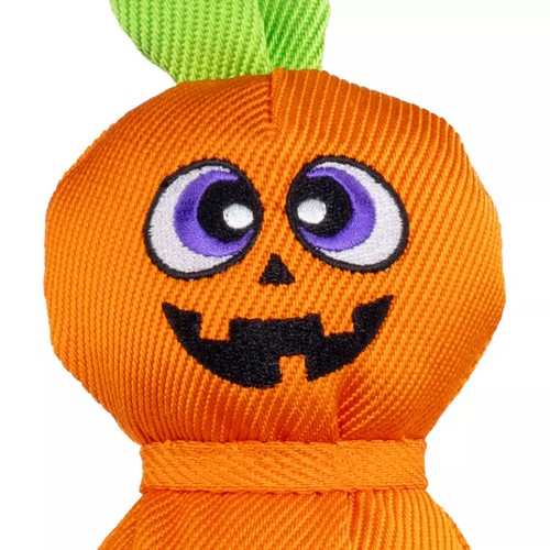 KONG Wubba Jack-o-Lantern L: Halloween hondenspeelgoed 5 Close up van het geborduurde pompoengezicht op de versterkte ballistische stof